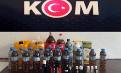 Afyon'da polis 21 litre kaçak alkol ele geçirdi