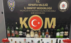 Isparta'da polis ekipleri litrelerce sahte içki ele geçirdi