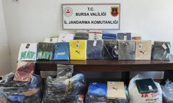 Bursa’da kaçak kıyafet taşıyan sürücü yakalandı