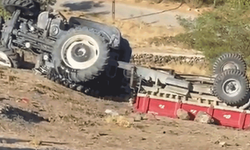 Aksaray'da baba oğul devrilen traktörde ağır yaralandı