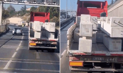 Eskişehir'de araca bağlanmadan taşınan tonluk beton bloklar trafiği tehlikeye düşürdü