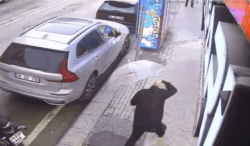 Yürürken başına cam parçası yağdı! Eskişehir’de o anlar kamerada